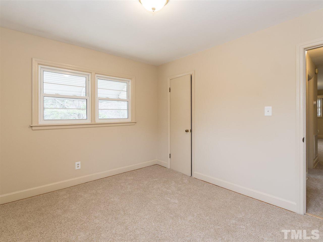 4321 James Road Raleigh, NC 27616 - Photo 19 of 23 an empty room with windows
