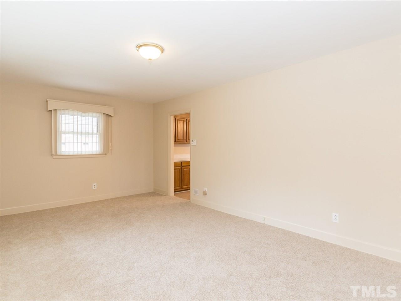 4321 James Road Raleigh, NC 27616 - Photo 3 of 23 an empty room with windows