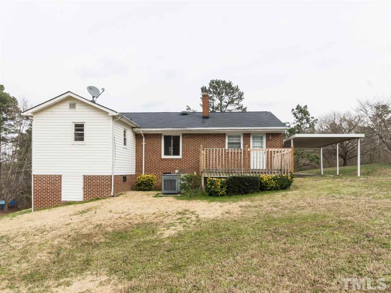 4321 James Road Raleigh, NC 27616 - Photo 22 of 23 a front view of a house with garden