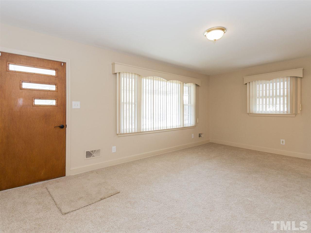 4321 James Road Raleigh, NC 27616 - Photo 4 of 23 an empty room with windows