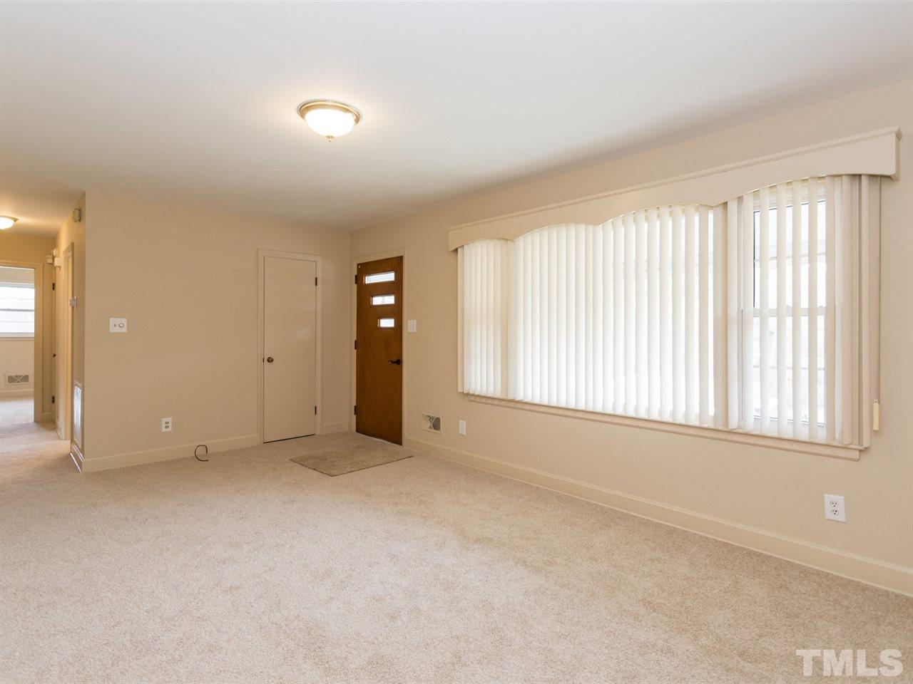 4321 James Road Raleigh, NC 27616 - Photo 6 of 23 an empty room with windows