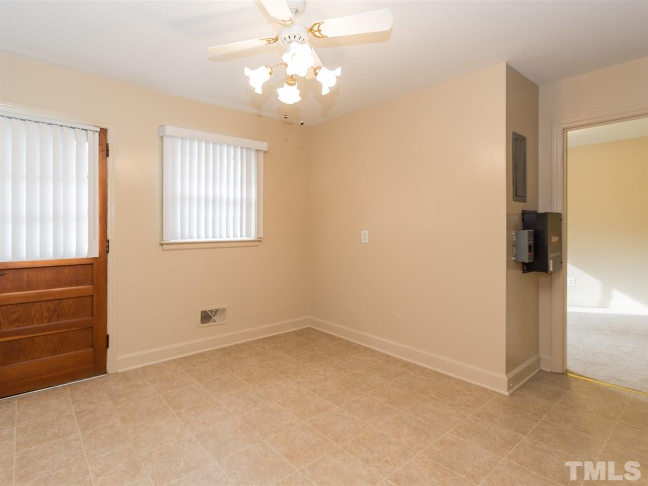 4321 James Road Raleigh, NC 27616 - Photo 10 of 23 wooden floor in an empty room with a window