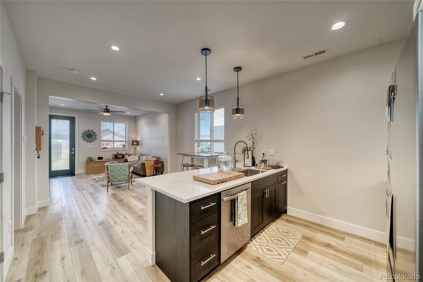 601 Scott Street, Unit A Salida, CO 81201 - Photo 15 of 31 a kitchen with a sink and cabinets
