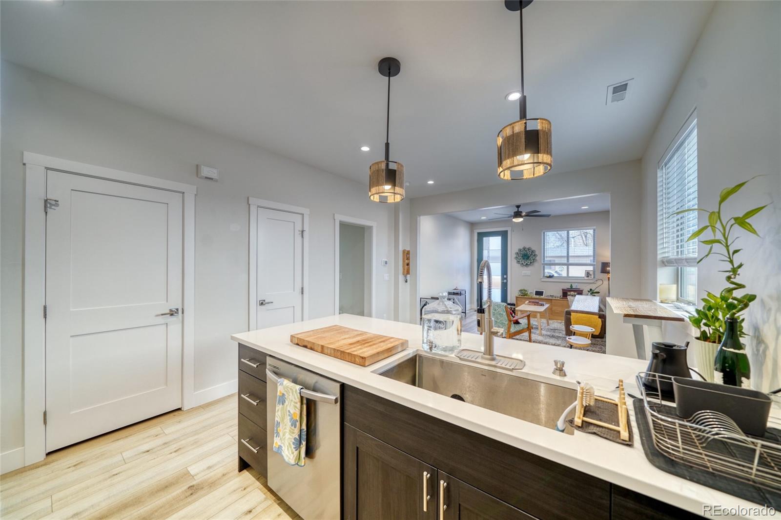 601 Scott Street, Unit A Salida, CO 81201 - Photo 17 of 31 a kitchen with a sink a counter space appliances and cabinets