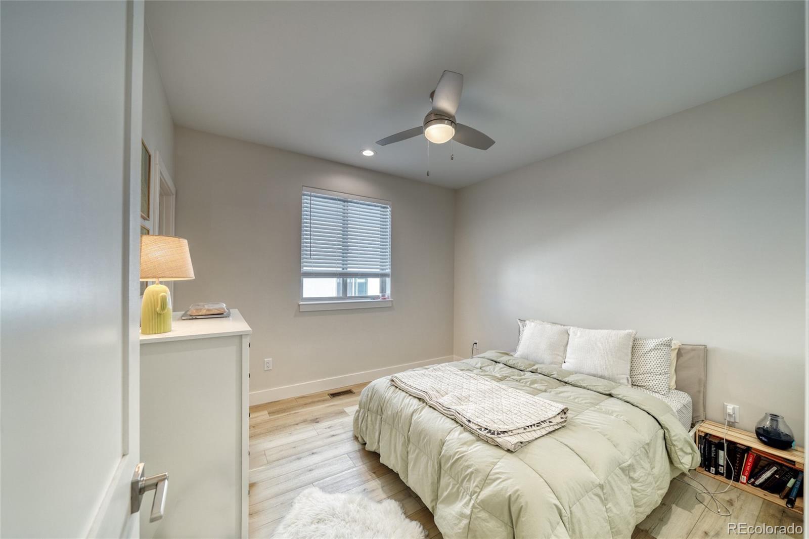 601 Scott Street, Unit A Salida, CO 81201 - Photo 19 of 31 a bedroom with a bed and a window