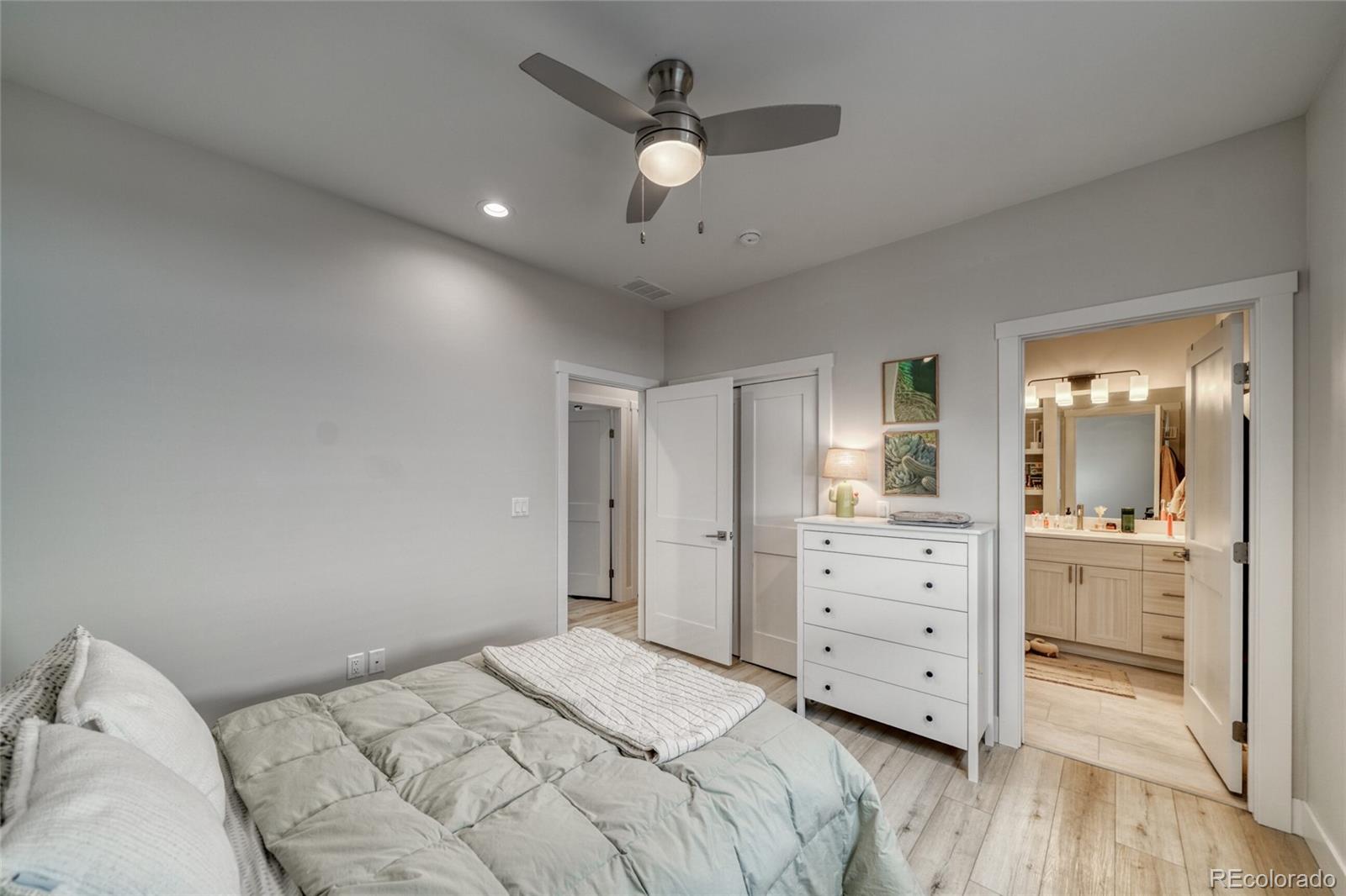 601 Scott Street, Unit A Salida, CO 81201 - Photo 20 of 31 a bedroom with a bed and a dresser