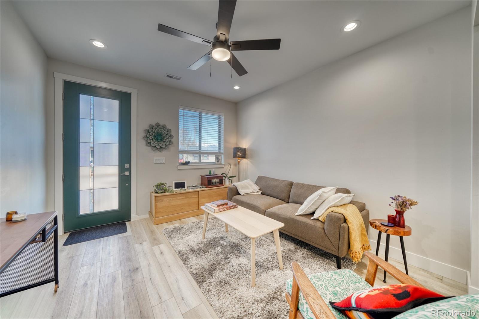 601 Scott Street, Unit A Salida, CO 81201 - Photo 9 of 31 a living room with furniture and a view of kitchen