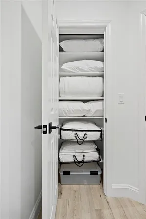 a view of a room with racks on the wall