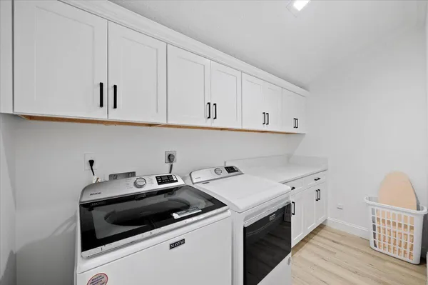 a view of a kitchen with washing machine