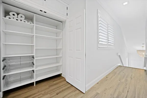 a view of a room with storage and utility room