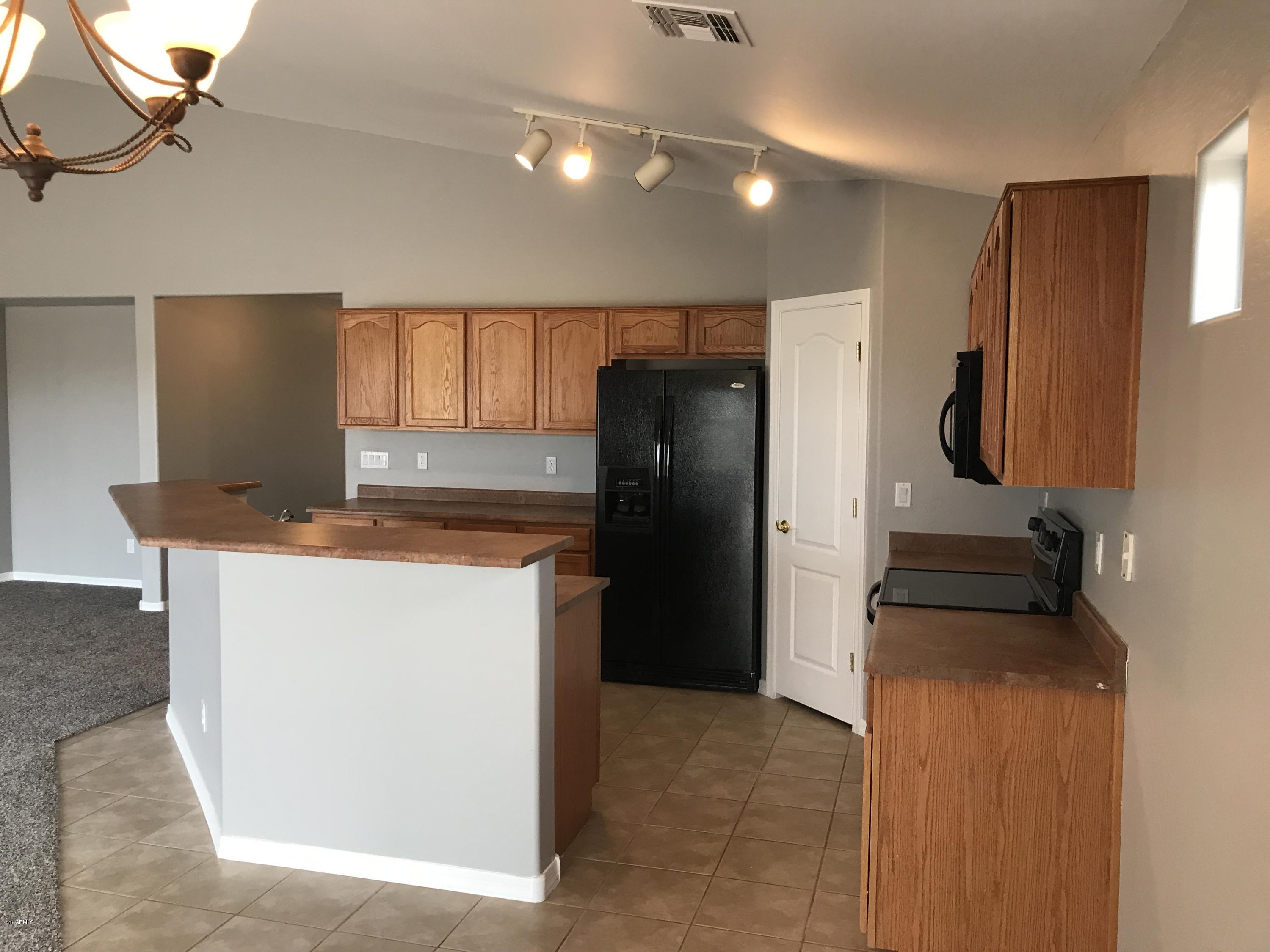 25634 West Ripple Road Buckeye, AZ 85326 - Photo 5 of 27 IMG_2429
