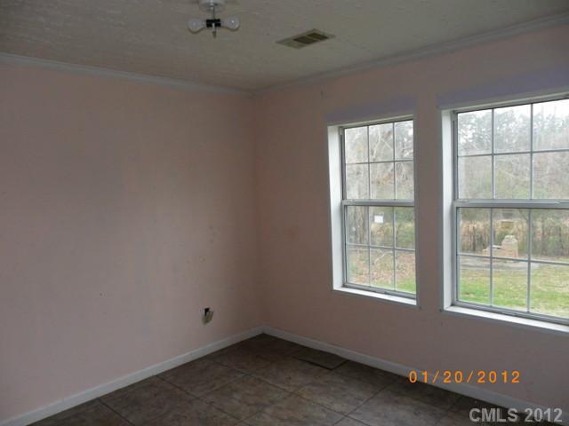 151 Hambright Road Clover, SC 29710 - Photo 8 of 11 an empty room with a window