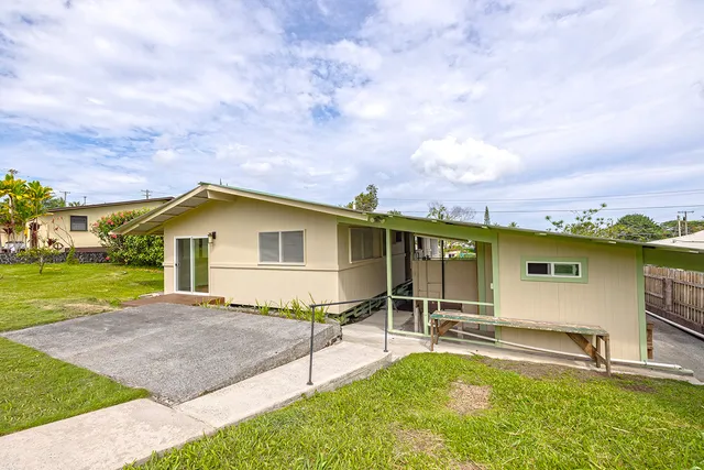 a house view with a garden space