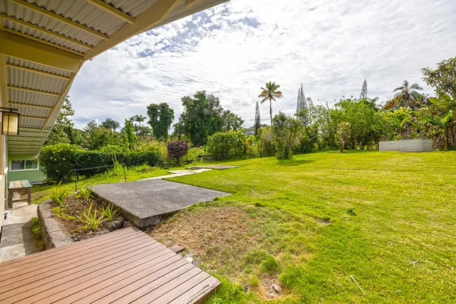 a view of a swimming pool with an outdoor space