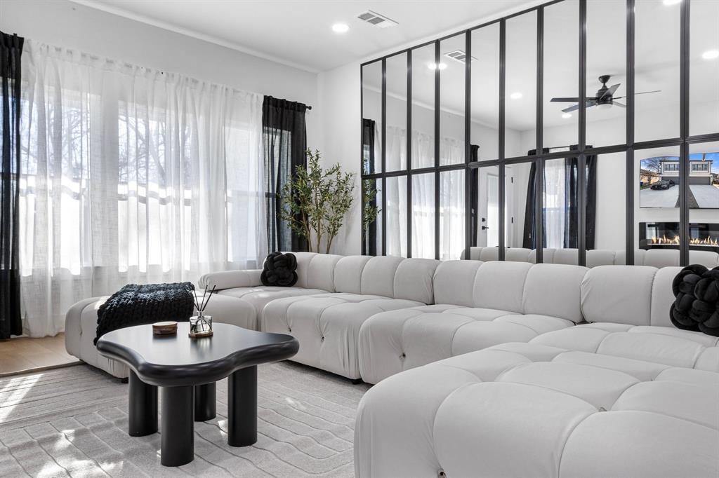 1511 Barry Avenue Dallas, TX 75223 - Photo 14 of 14 a living room with furniture and a large window
