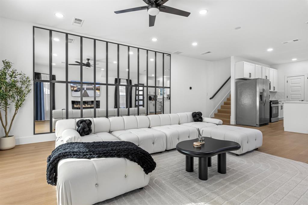 1511 Barry Avenue Dallas, TX 75223 - Photo 2 of 14 a living room with furniture and a large window
