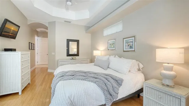 a bathroom with a toilet and a window