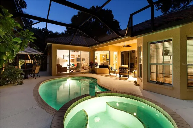 a view of a house with sitting area and furniture