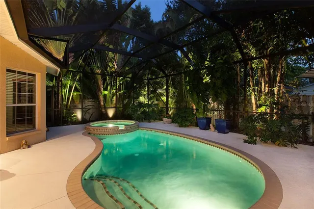 an aerial view of multiple houses with yard