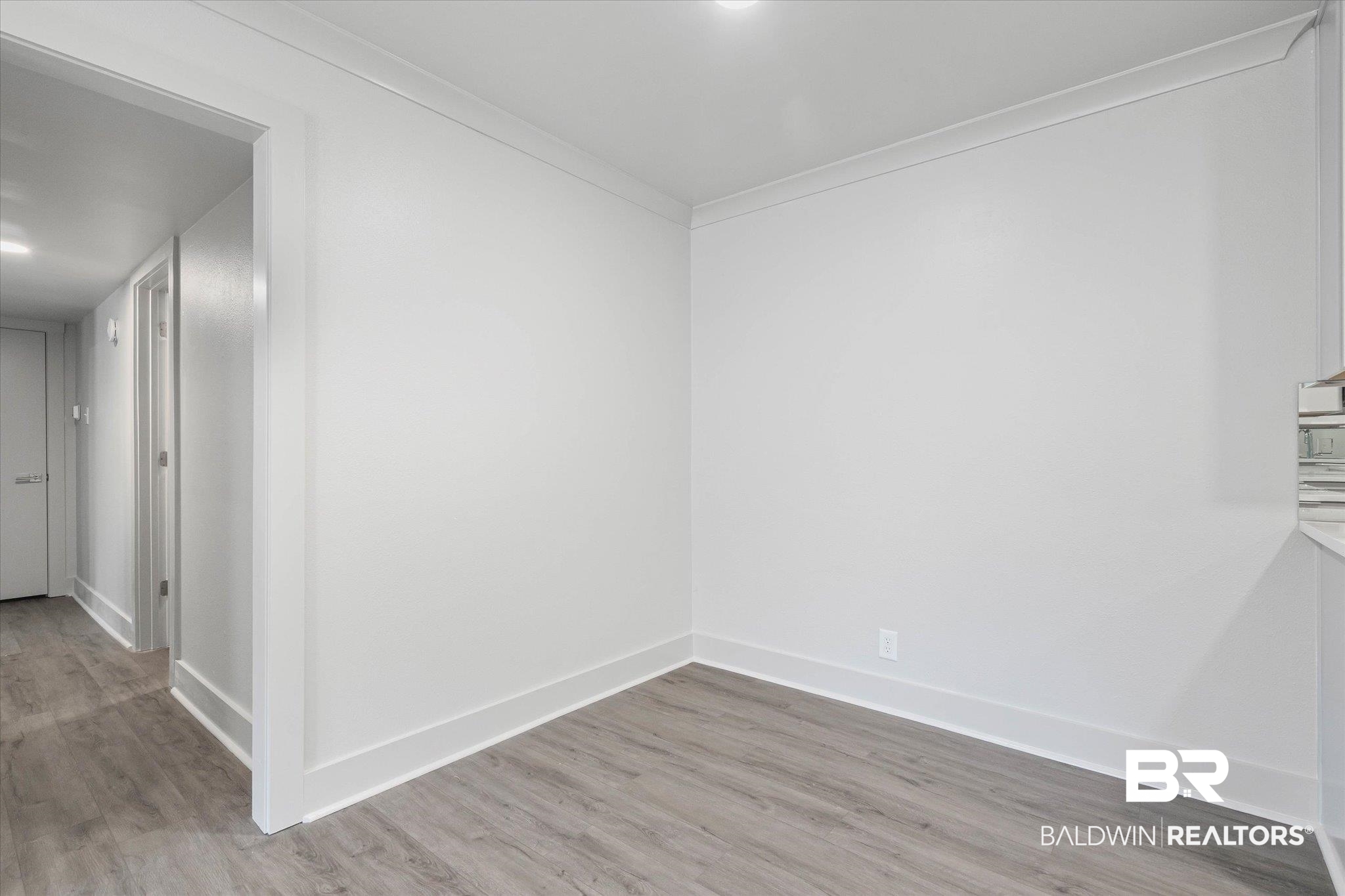 3655 Old Shell Road, Unit 712 Mobile, AL 36608 - Photo 8 of 19 Unfurnished room with light wood finished floors and recessed lighting