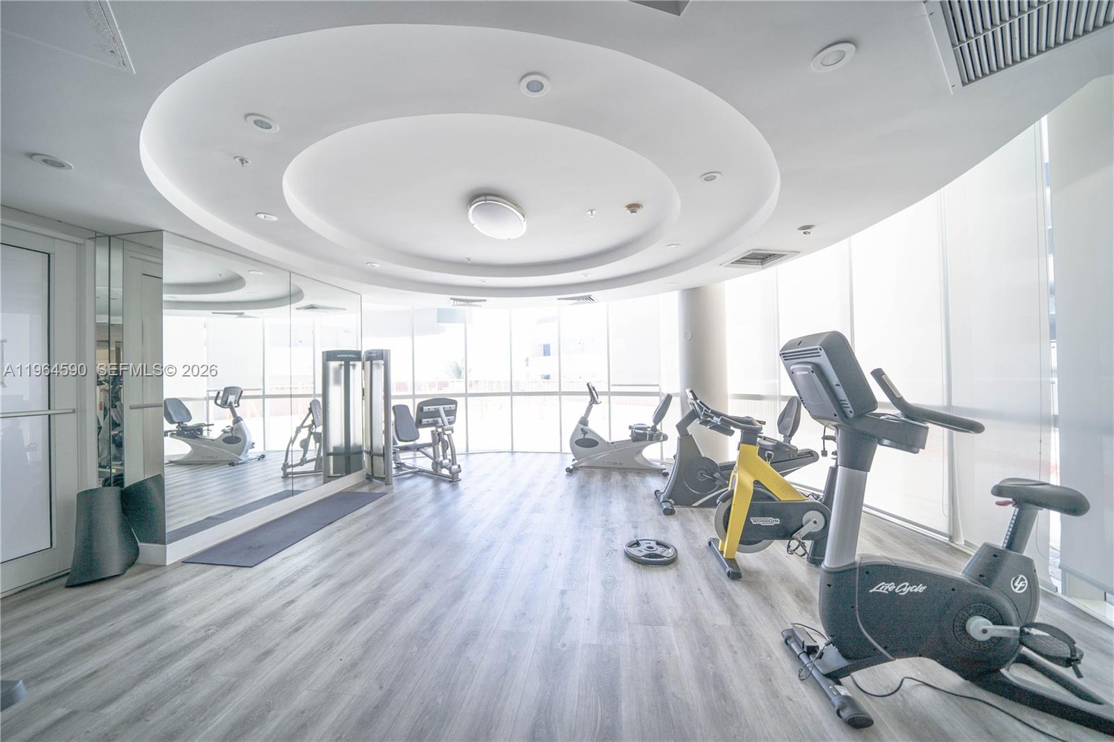 6301 Collins Avenue, Unit 2802 Miami Beach, FL 33141 - Photo 24 of 28 a view of a living room and dining room