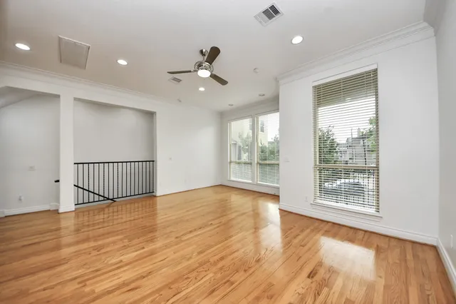 a view of kitchen with cabinets and wooden floor
