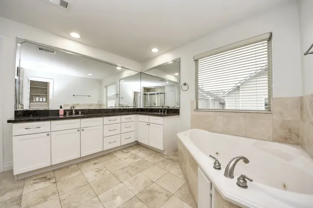 a bathroom with a bathtub