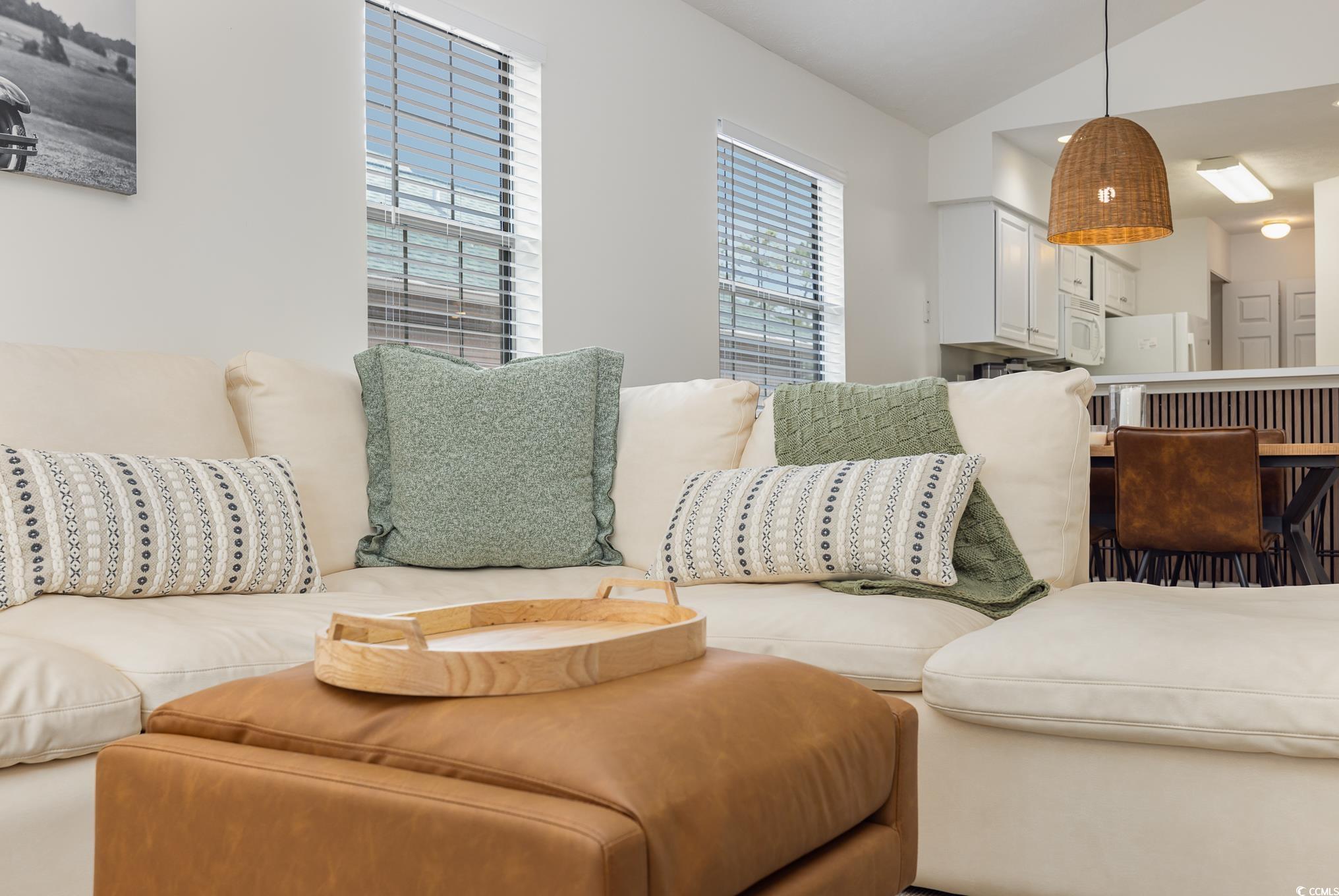 504 Pinehurst Lane, Unit 18H Pawleys Island, SC 29585 - Photo 17 of 28 Living room featuring vaulted ceiling
