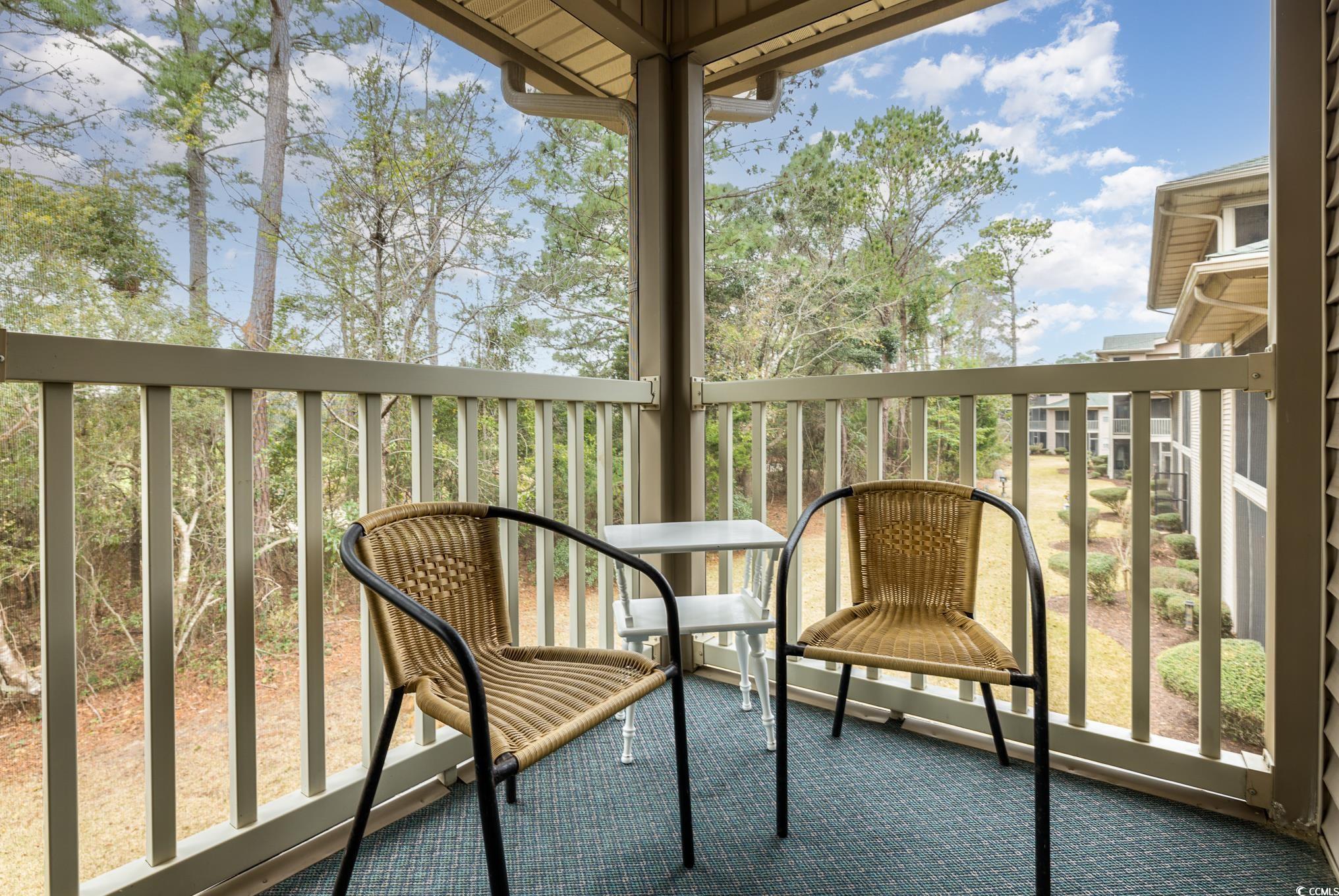 504 Pinehurst Lane, Unit 18H Pawleys Island, SC 29585 - Photo 26 of 28 View of unfurnished sunroom