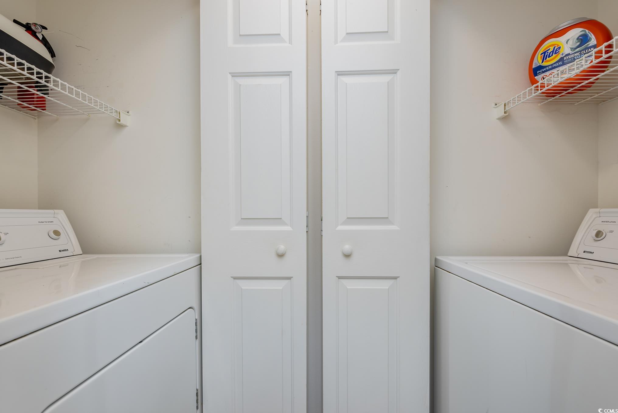 504 Pinehurst Lane, Unit 18H Pawleys Island, SC 29585 - Photo 10 of 28 Laundry area with washer and clothes dryer