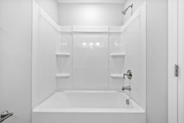 a bathroom with a bathtub