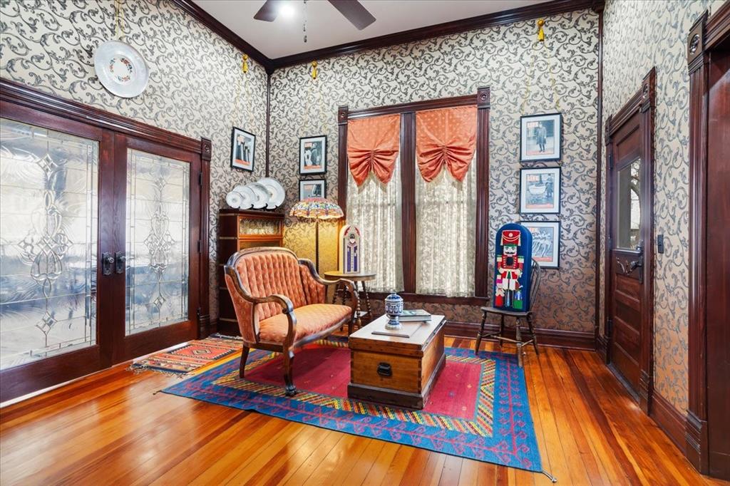 300 West 6th Street Bonham, TX 75418 - Photo 19 of 40 a living room with furniture fireplace and flat screen tv