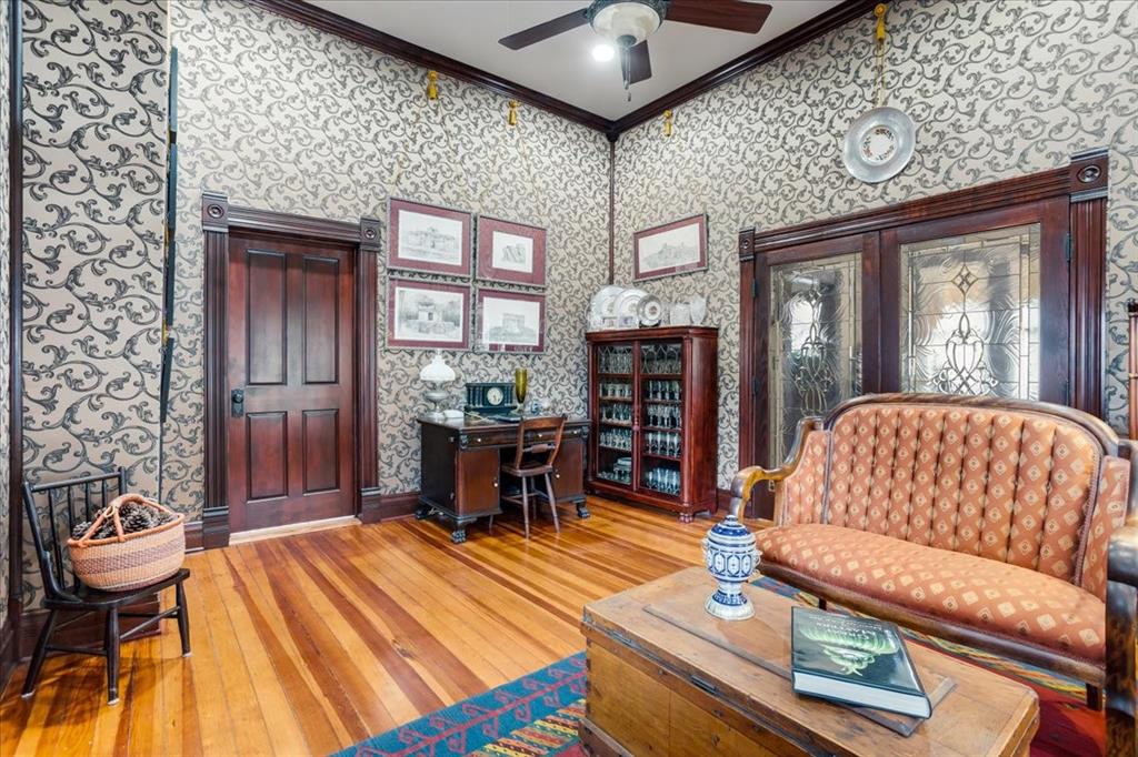 300 West 6th Street Bonham, TX 75418 - Photo 20 of 40 a living room with furniture and a fireplace