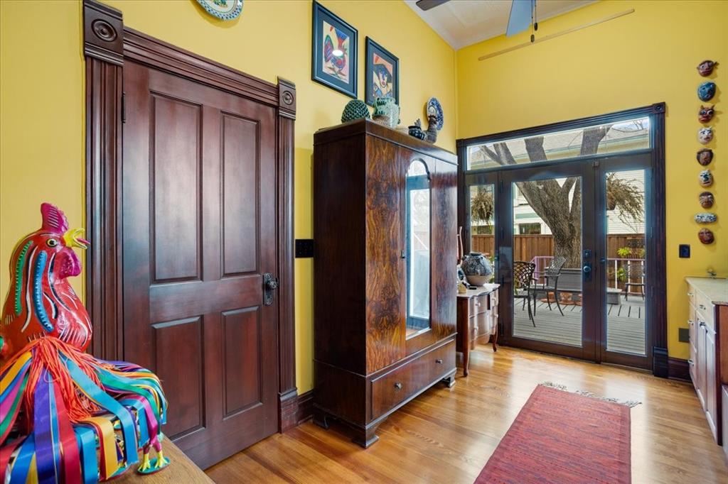 300 West 6th Street Bonham, TX 75418 - Photo 30 of 40 a view of an entryway with a chandelier