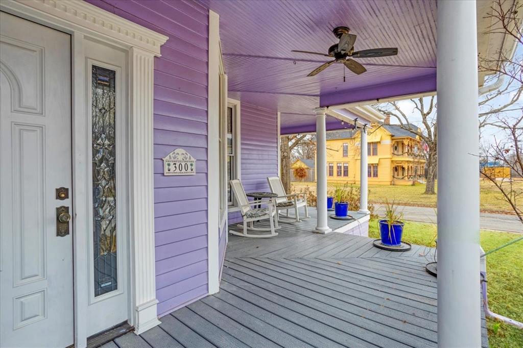 300 West 6th Street Bonham, TX 75418 - Photo 4 of 40 a view of a living room with a large window