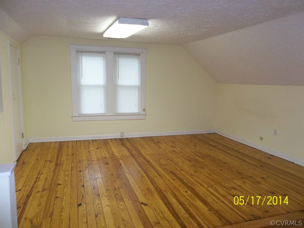 4286 Oak Hill Road Buckingham, VA 23921 - Photo 2 of 13 an empty room with wooden floor