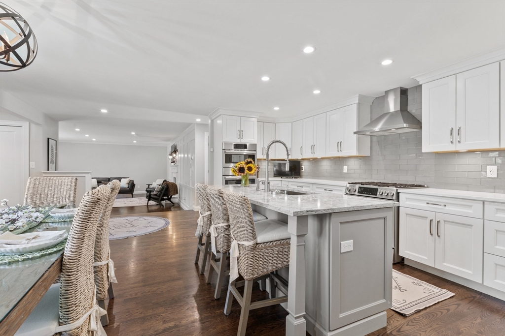 4 Wildmeadow Road Boxford, MA 01921 - Photo 3 of 42 a kitchen with a sink white cabinets and stainless steel appliances
