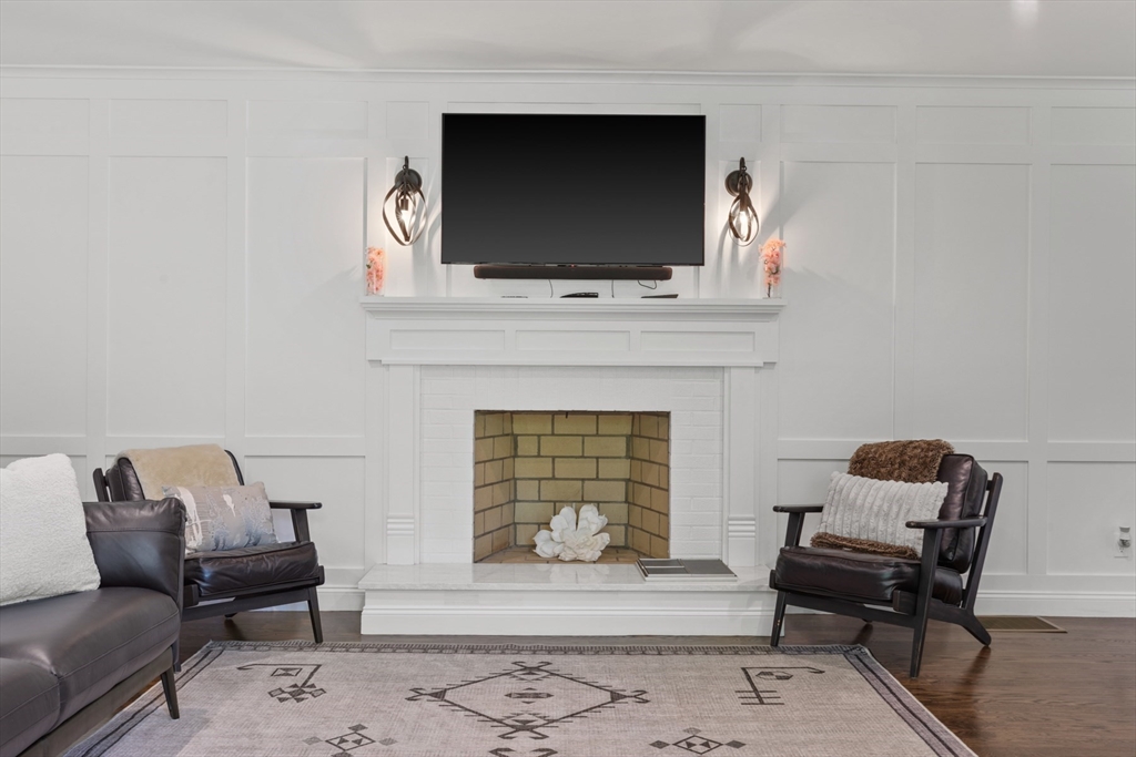 4 Wildmeadow Road Boxford, MA 01921 - Photo 10 of 42 a living room with furniture and a flat screen tv
