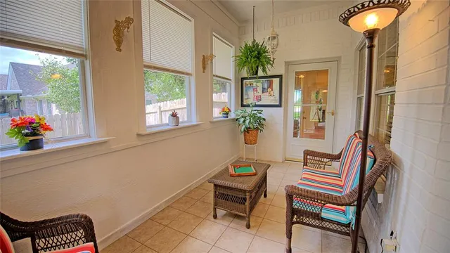 a outdoor living space with furniture and a potted plant