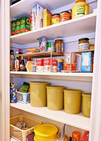 a living room filled with lots of furniture