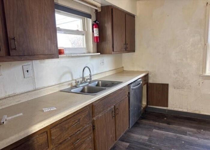 406 Grove Street McKees Rocks, PA 15136 - Photo 9 of 14 a kitchen with a sink and cabinets
