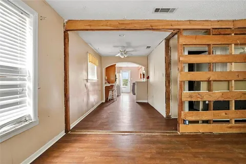 a view of living room with a large window