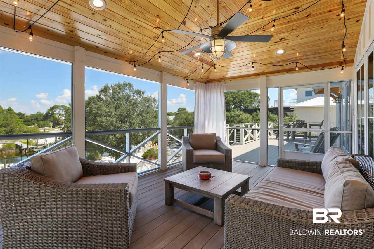32851 River Road Orange Beach, AL 36561 - Photo 22 of 30 Enclosed screened deck
