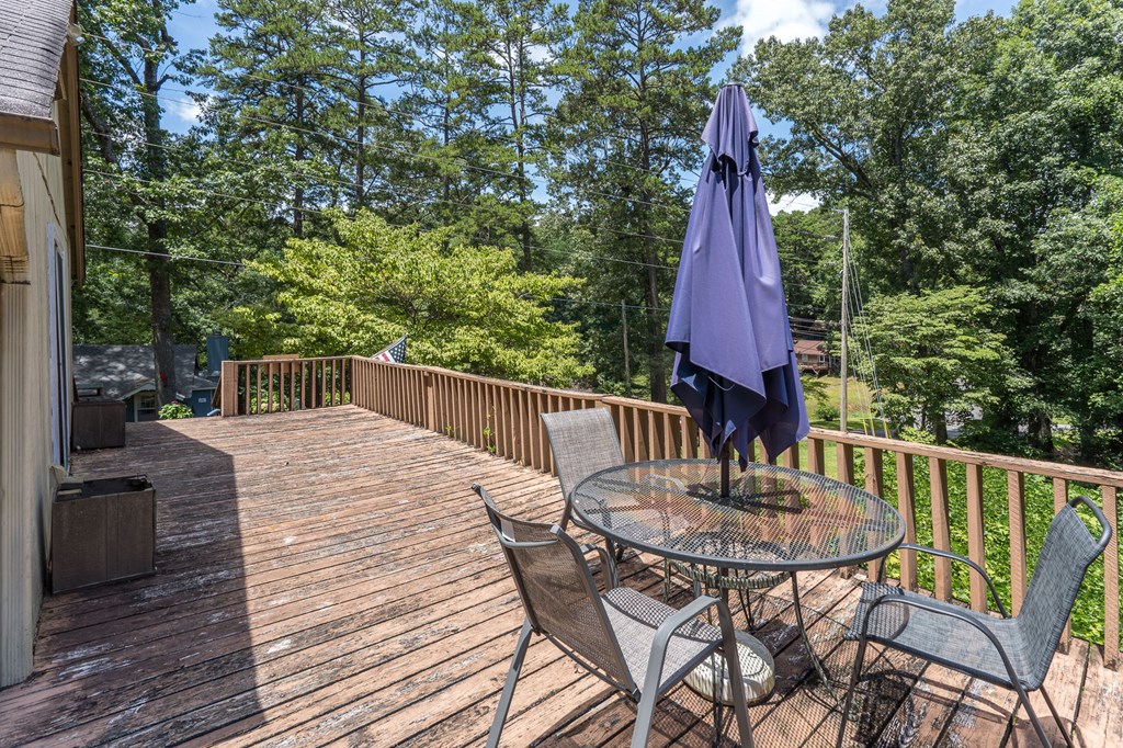 275 Village Road Murphy, NC 28906 - Photo 12 of 47 a view of a table and chairs in the patio