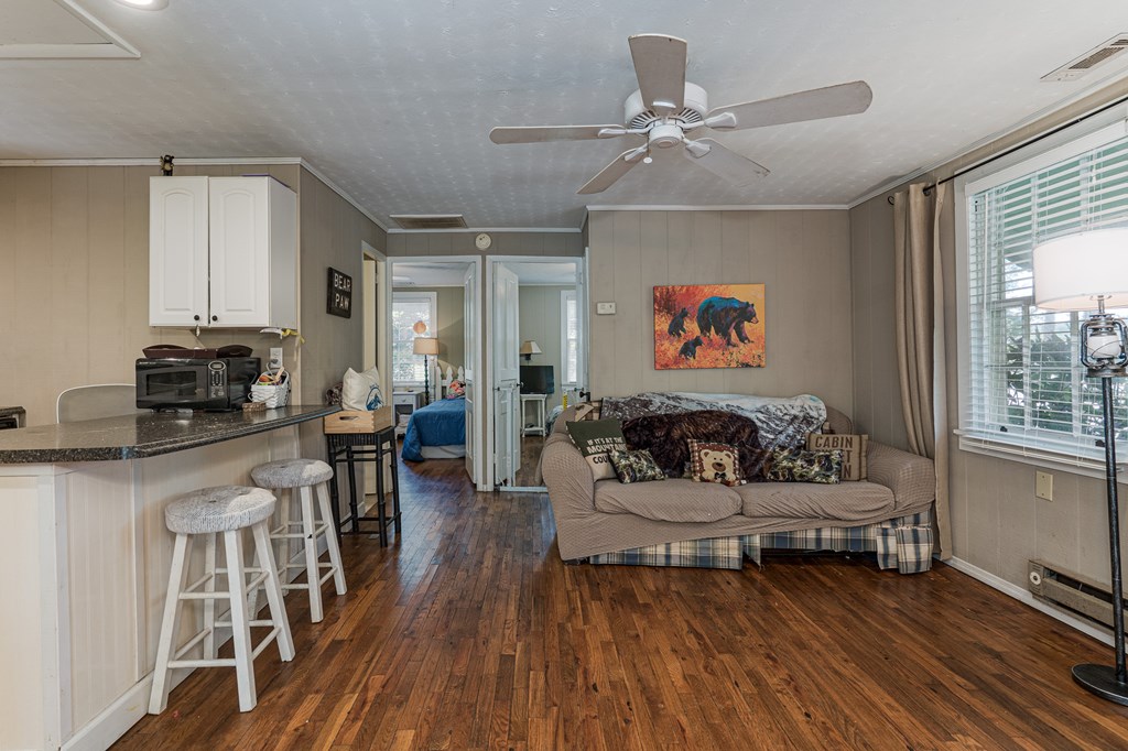 275 Village Road Murphy, NC 28906 - Photo 17 of 47 a living room with furniture and a wooden floor