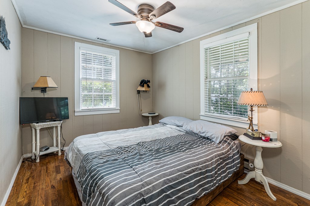 275 Village Road Murphy, NC 28906 - Photo 29 of 47 a bedroom with a bed and a flat screen tv