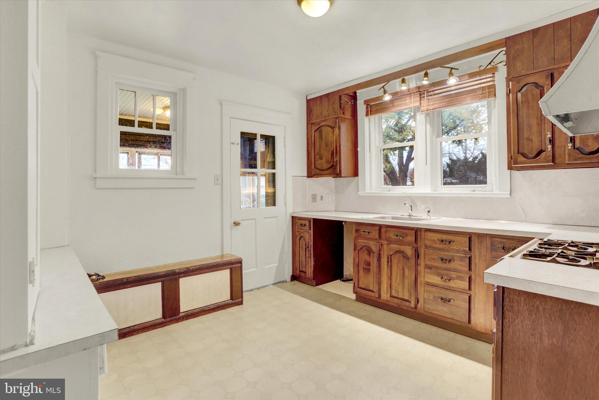 711 Pine Street Steelton, PA 17113 - Photo 14 of 37 a view of kitchen with cabinets and window