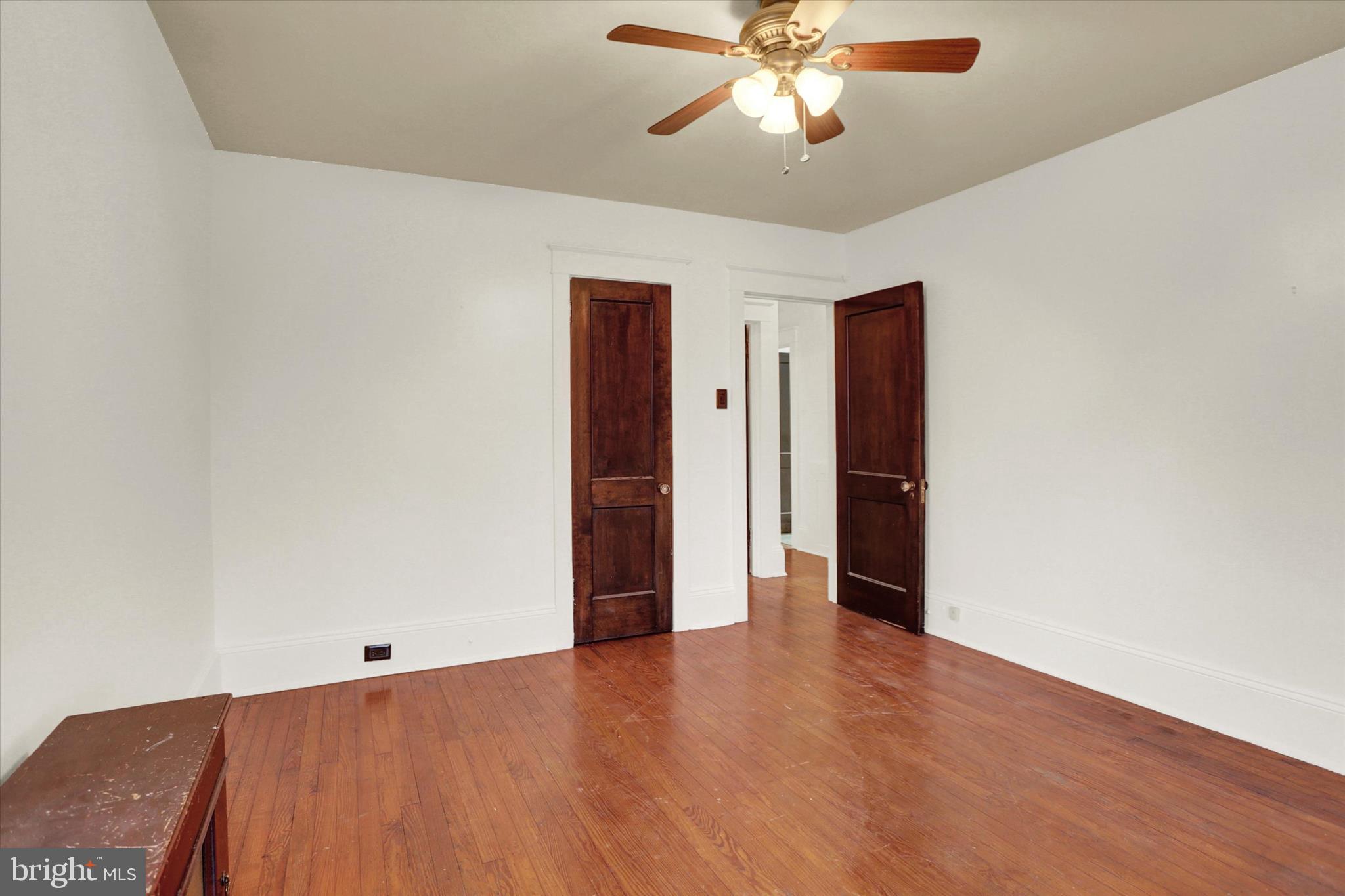 711 Pine Street Steelton, PA 17113 - Photo 19 of 37 a view of an empty room with wooden floor
