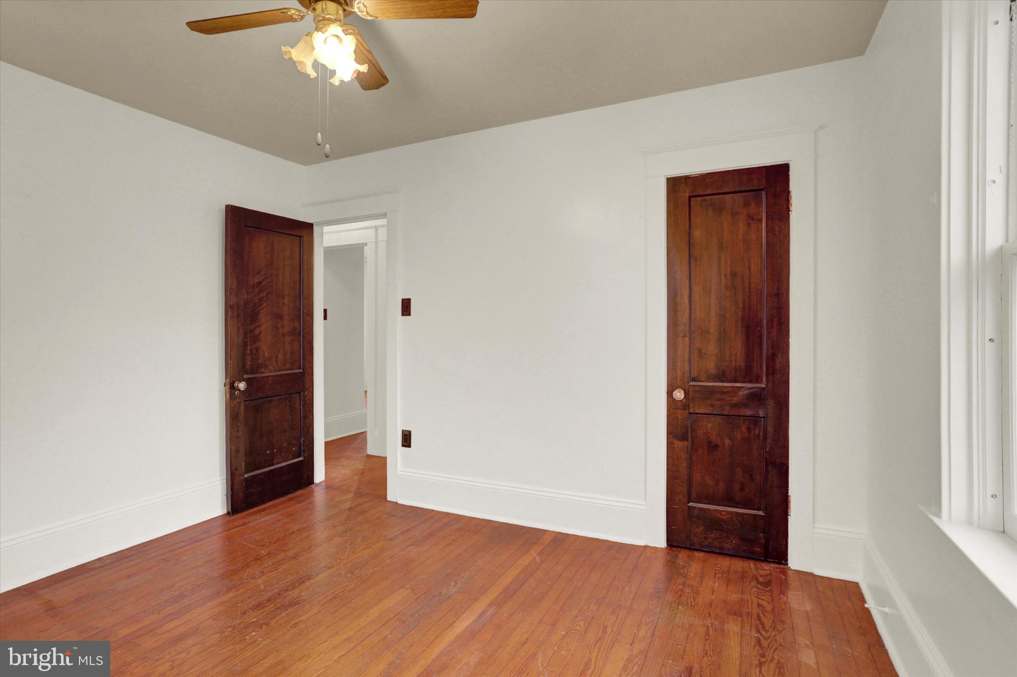 711 Pine Street Steelton, PA 17113 - Photo 20 of 37 an empty room with wooden floor and closet