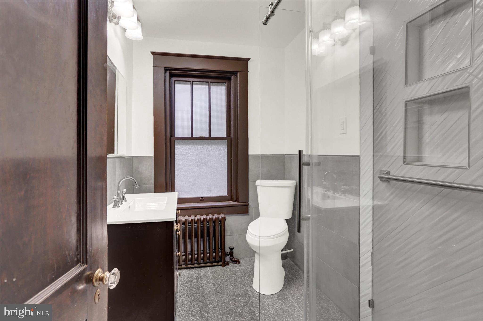 711 Pine Street Steelton, PA 17113 - Photo 23 of 37 a bathroom with a toilet sink and mirror